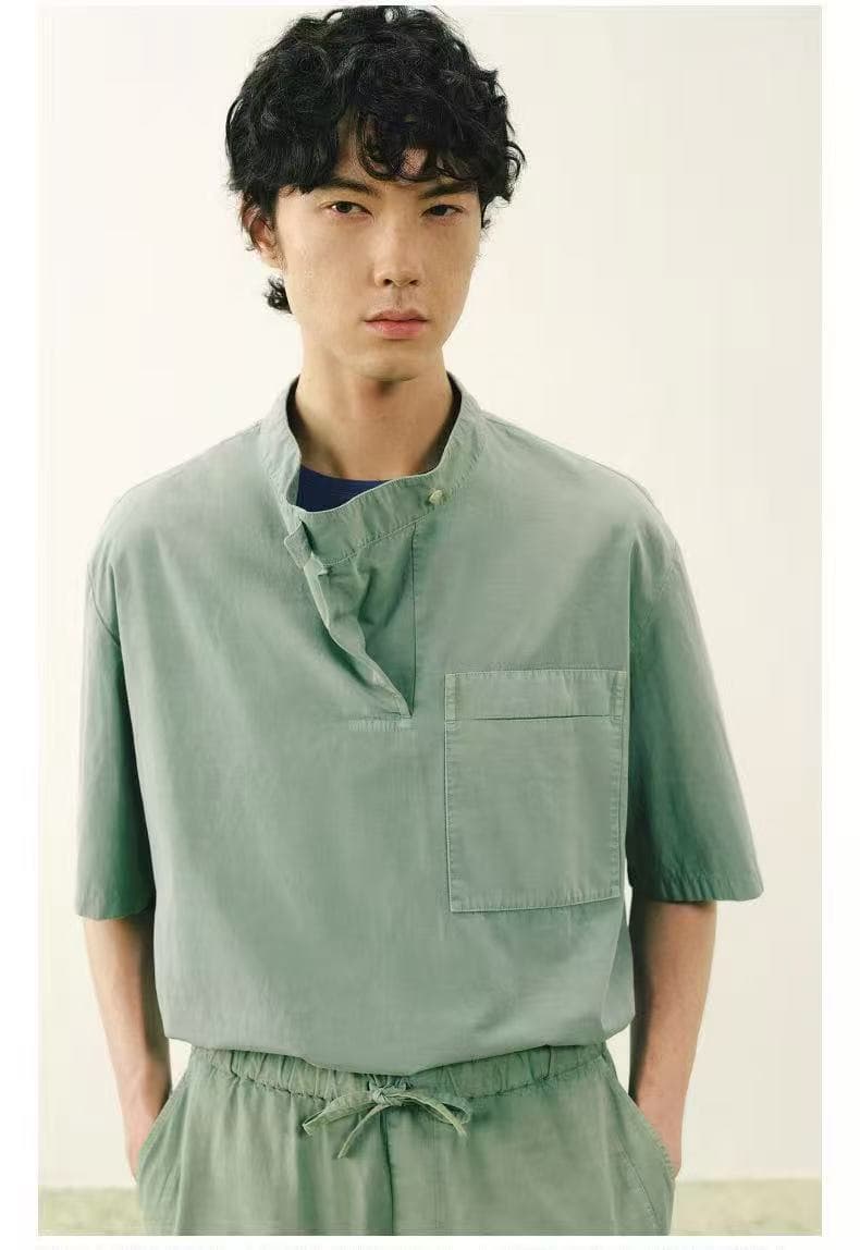 CROQUIS Spring/Summer 2026 menswear look in soft sage green.